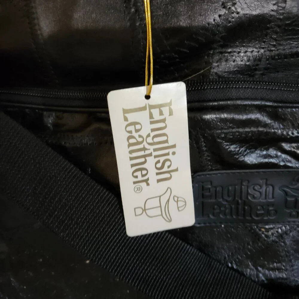Vintage English Leather bi fold garment bag. NEW